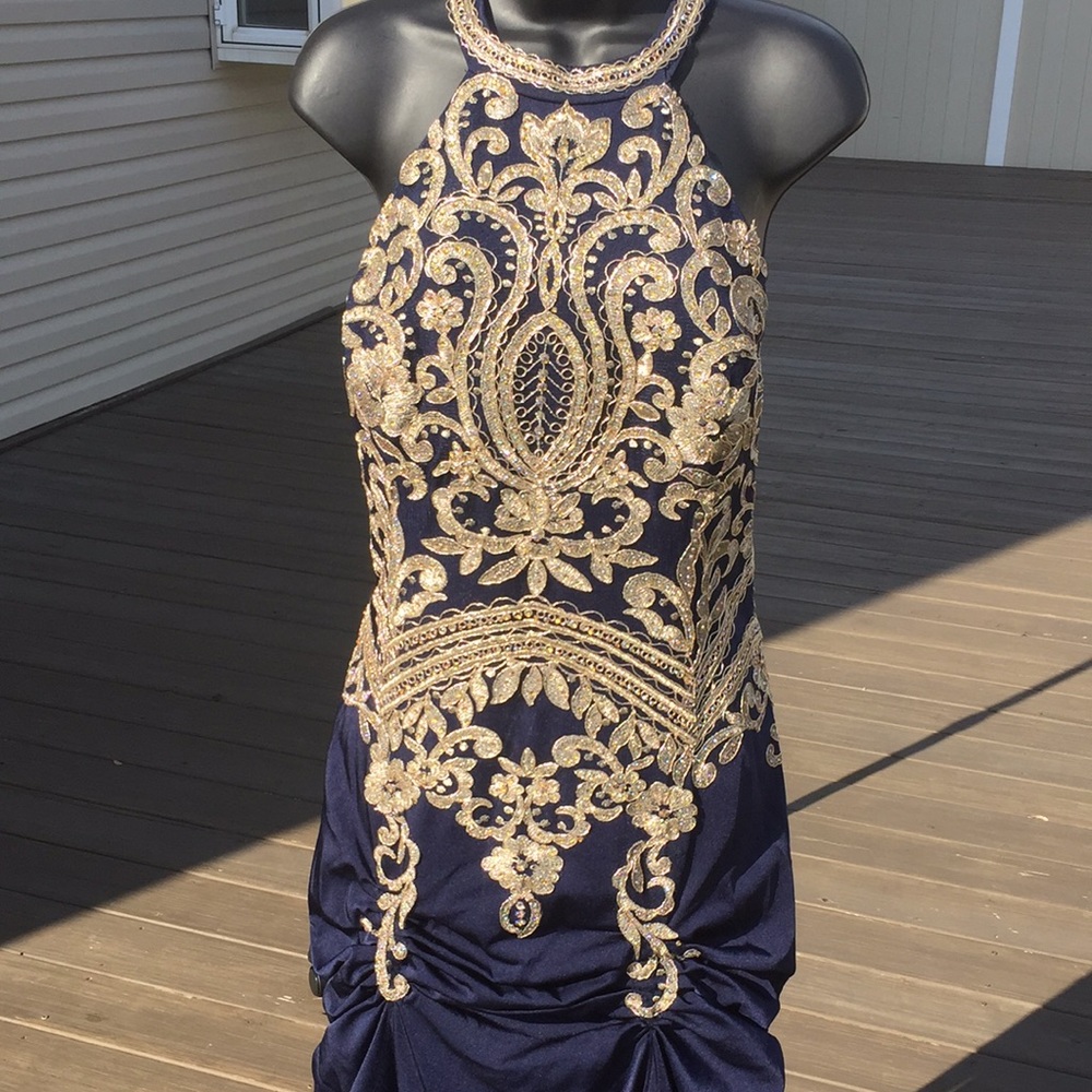 Beautiful gown with small train by Let’s, blue and gold